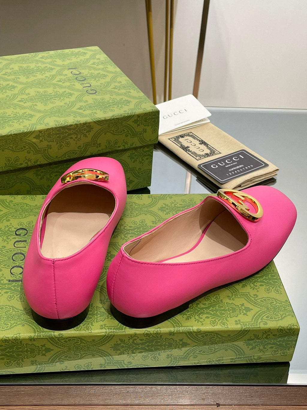 BLONDIE LOGO-PLAQUE LOAFERS IN BRIGHT PINK CALFSKIN WITH GOLD HARDWARE