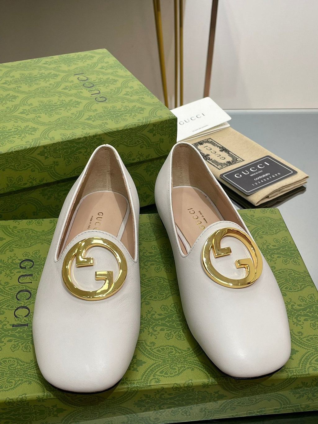 BLONDIE LOGO-PLAQUE LOAFERS IN WHITE CALFSKIN WITH GOLD HARDWARE