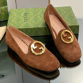 BLONDIE LOGO-PLAQUE LOAFERS IN BRONZE BROWN SUEDE WITH GOLD HARDWARE