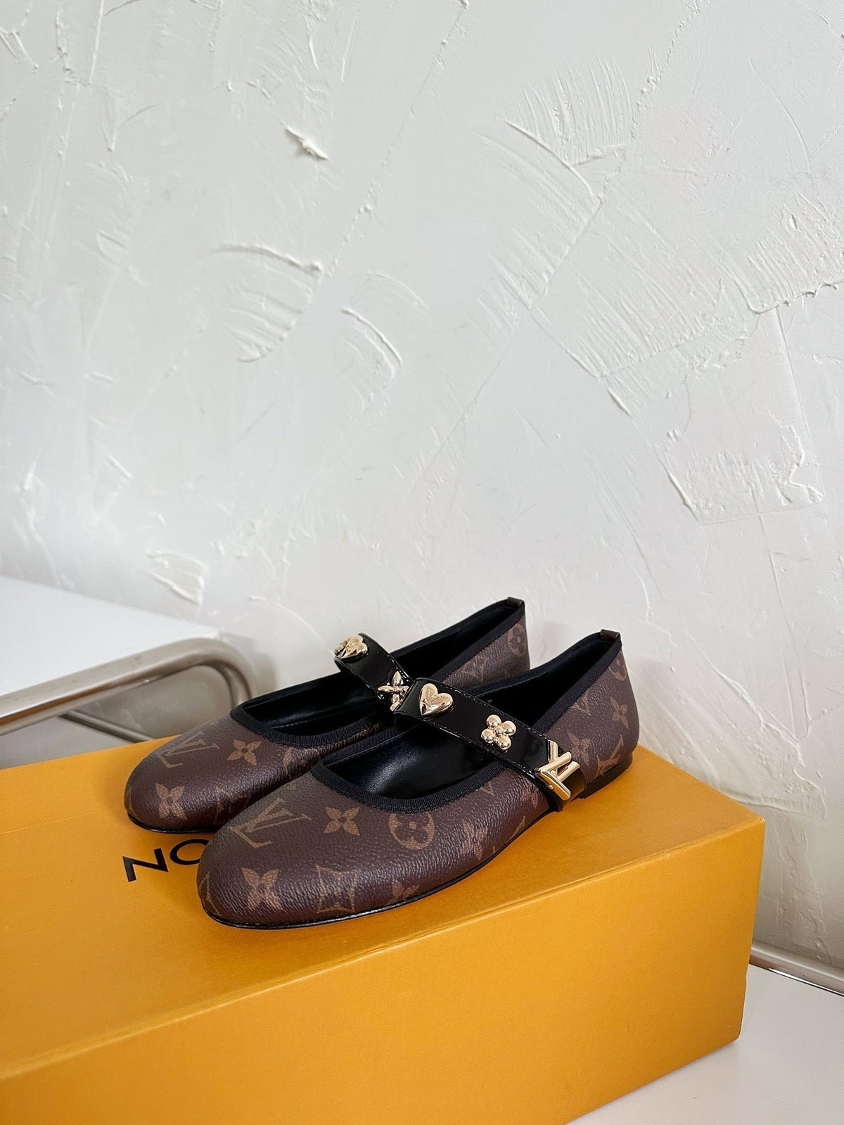 ROMY FLAT BALLERINA IN CHOCOLATE BROWN MONOGRAM CALFSKIN