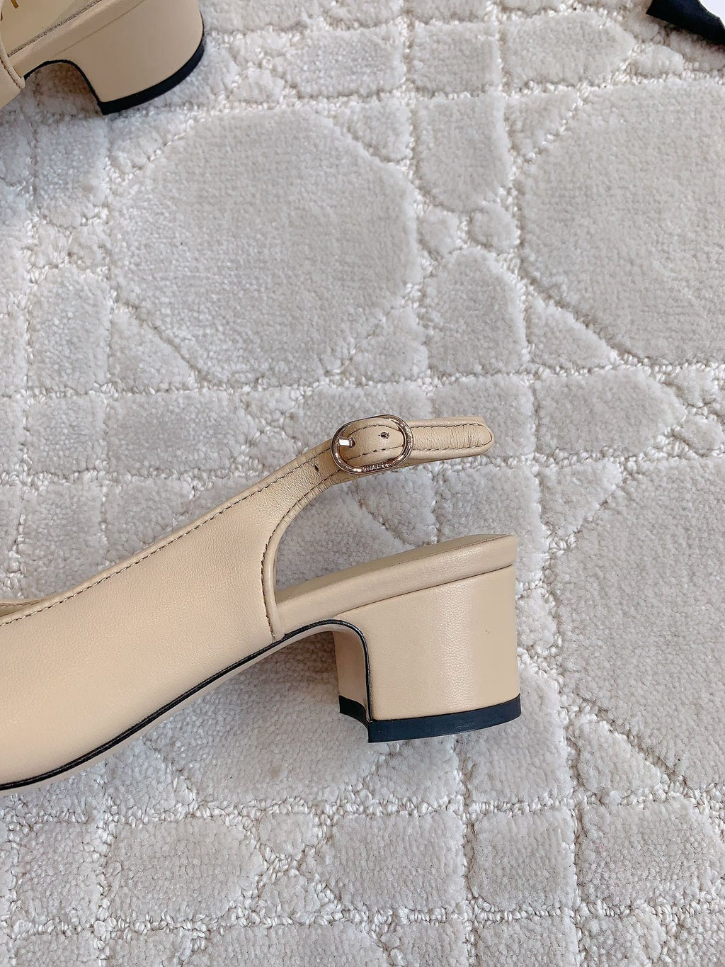 SLINGBACKS IN BEIGE CREAM MIX BLACK SHEEPSKIN
