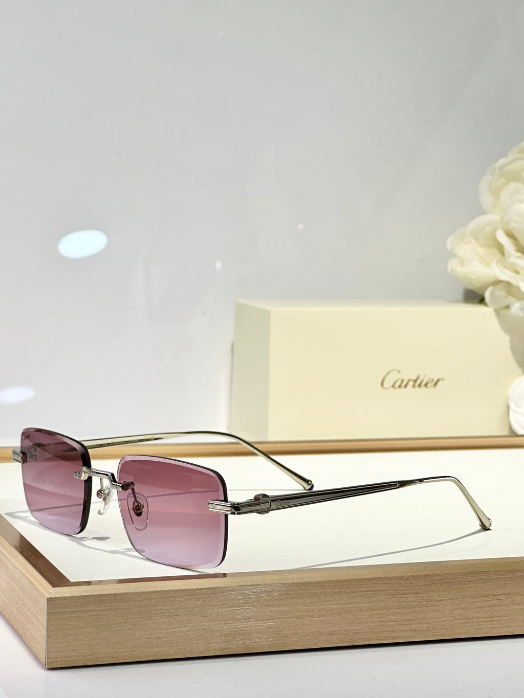 C DE RIMLESS SQUARE FRAME SUNGLASSES CT0610S IN METAL