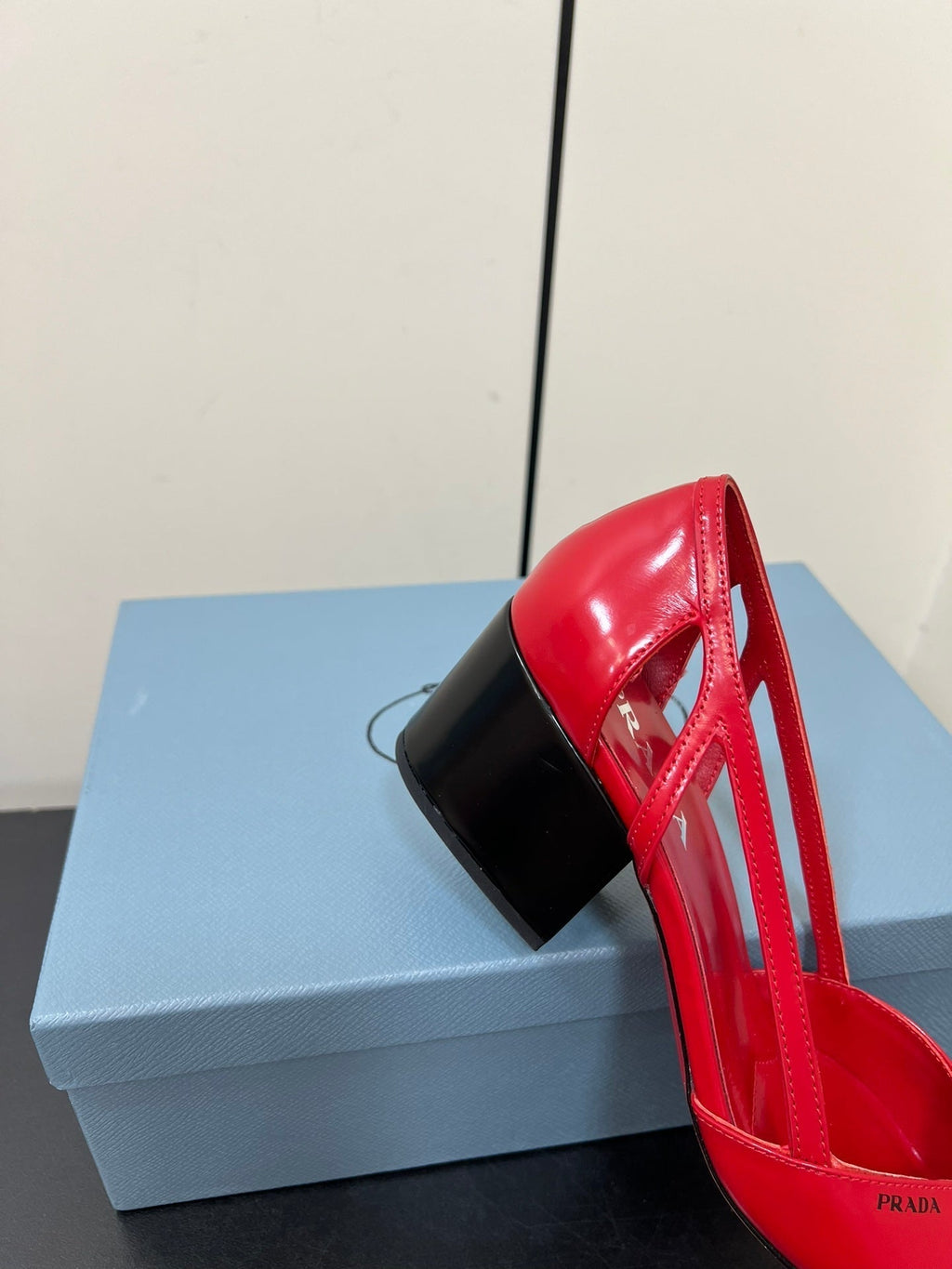 BRUSHED CUT-OUT PUMPS IN RED CALFSKIN