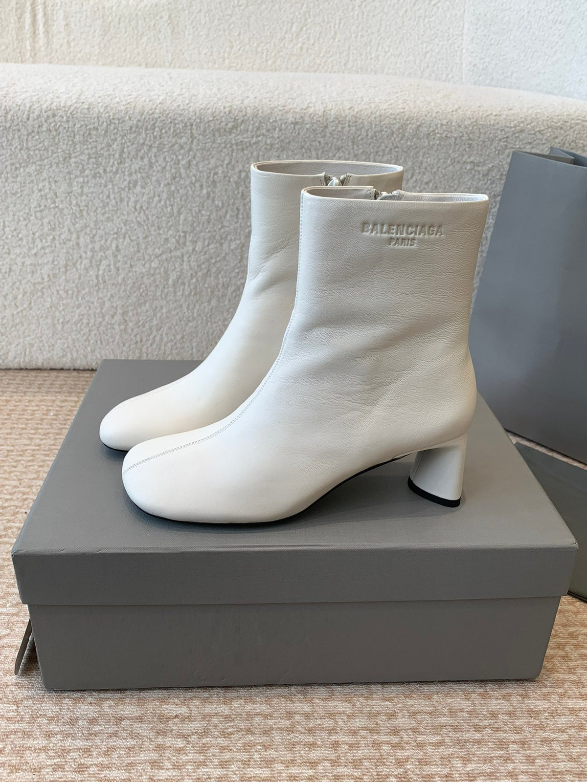 ANKLE BOOTS IN WHITE LOGO EMBOSSED SOFT SHEEPSKIN