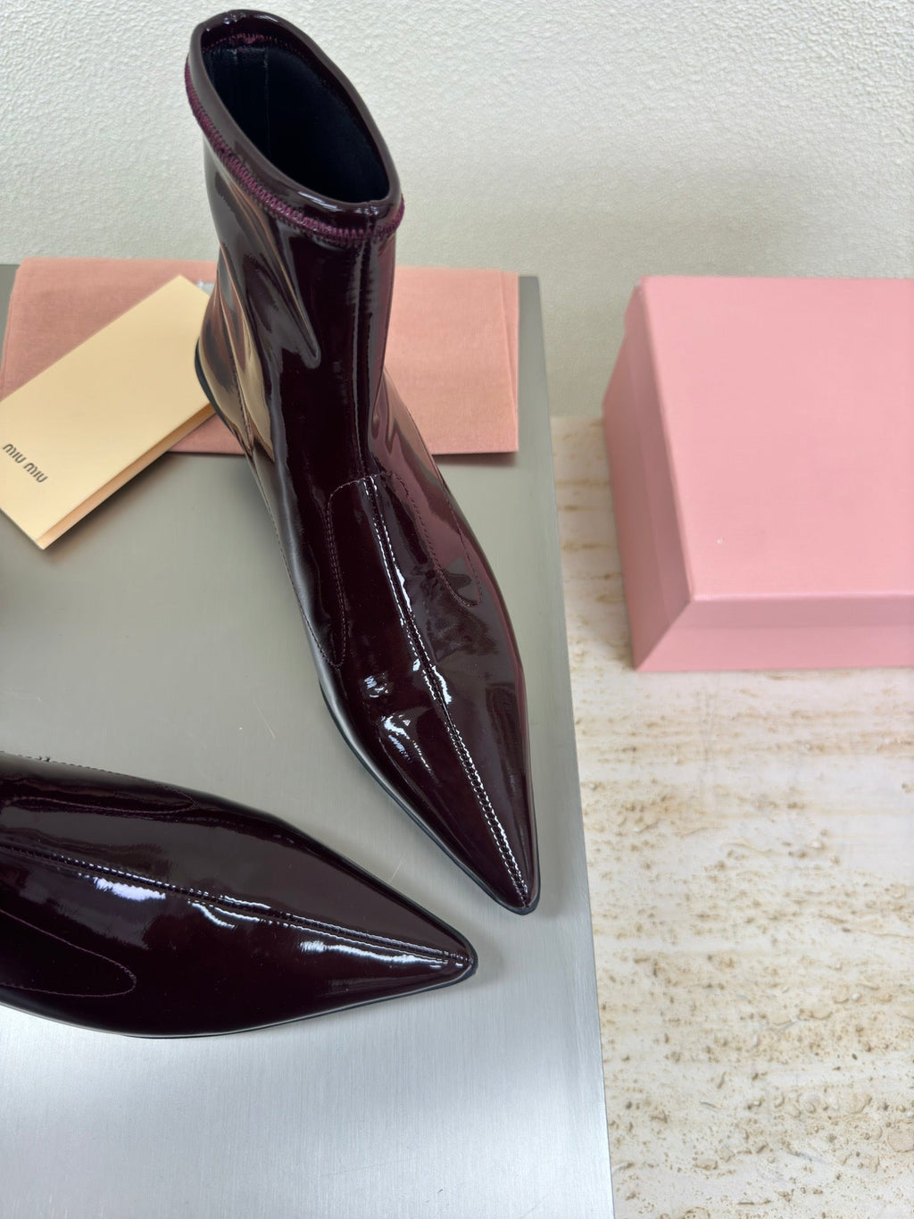 ANKLE POINTED-TOE BOOTS IN MAHOGANY GLOSSY CALFSKIN