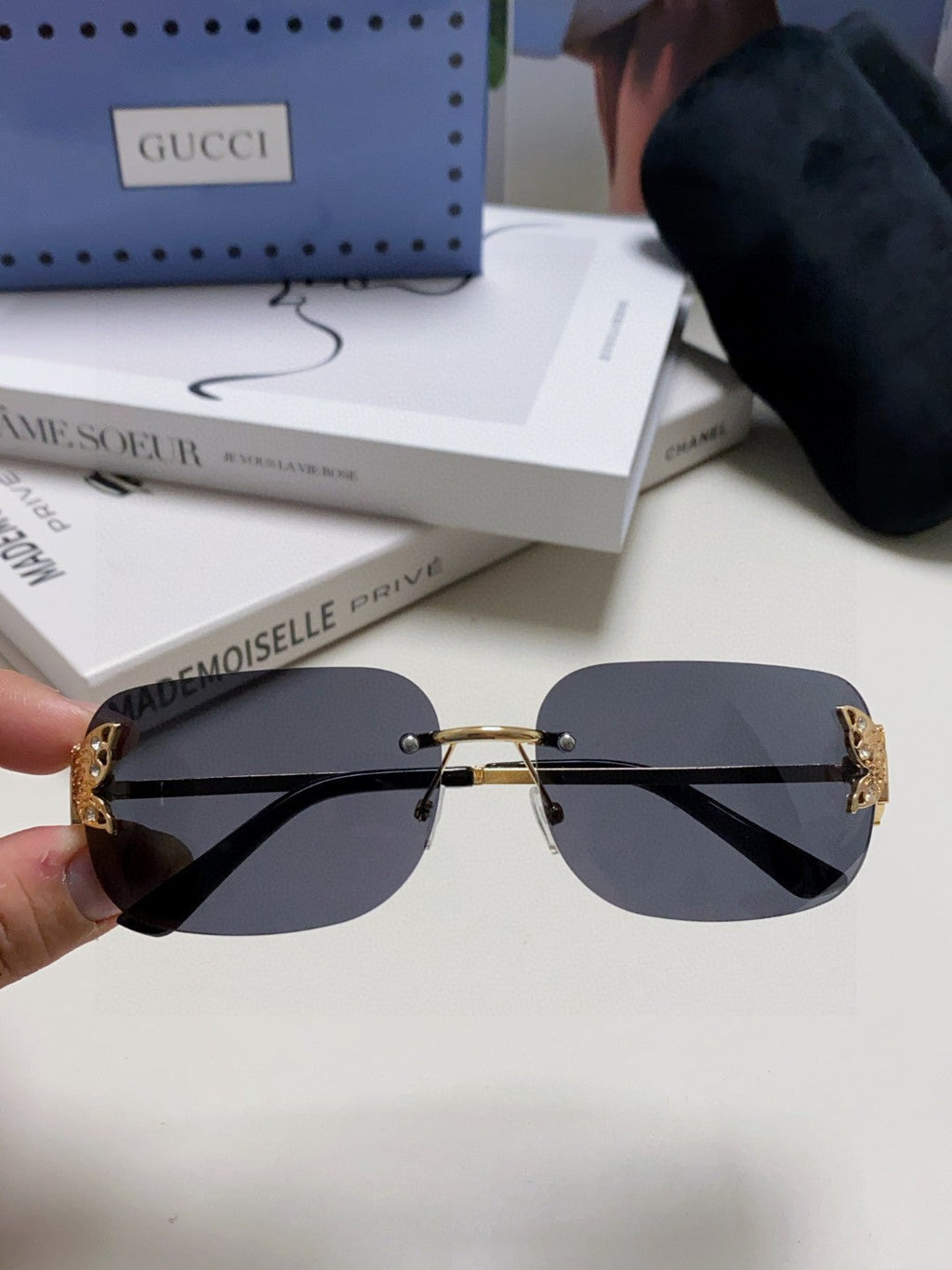 BUTTERFLY EMBELLISHED RIMLESS RECTANGULAR FRAME SUNGLASSES 570245 IN METAL