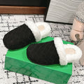 REGGIE SLIPPER IN BLACK SUEDE AND SHEARLING LINING