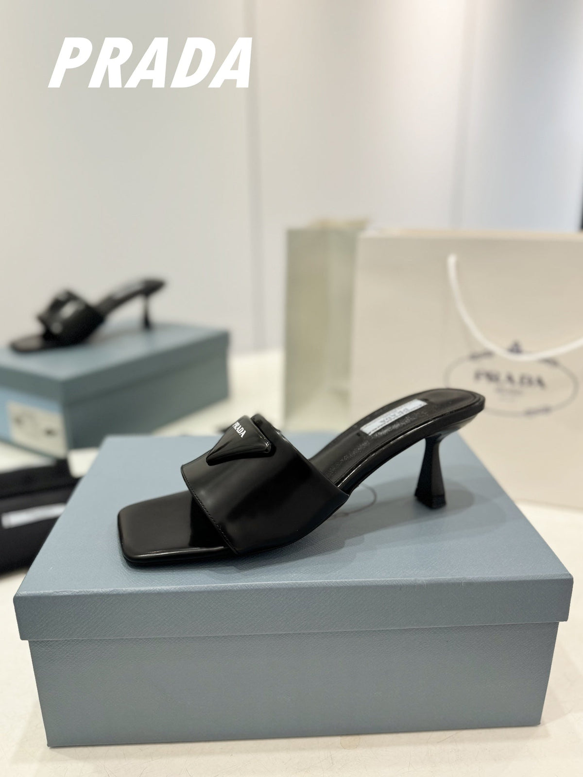 PRA BRUSHED LEATHER HEELED SLIDES BLACK