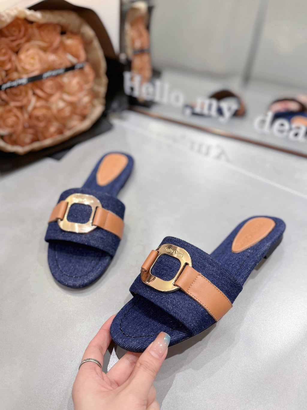 SLIDE MULE IN NAVY BLUE DENIM AND BROWN CALFSKIN GOLD HARDWARE